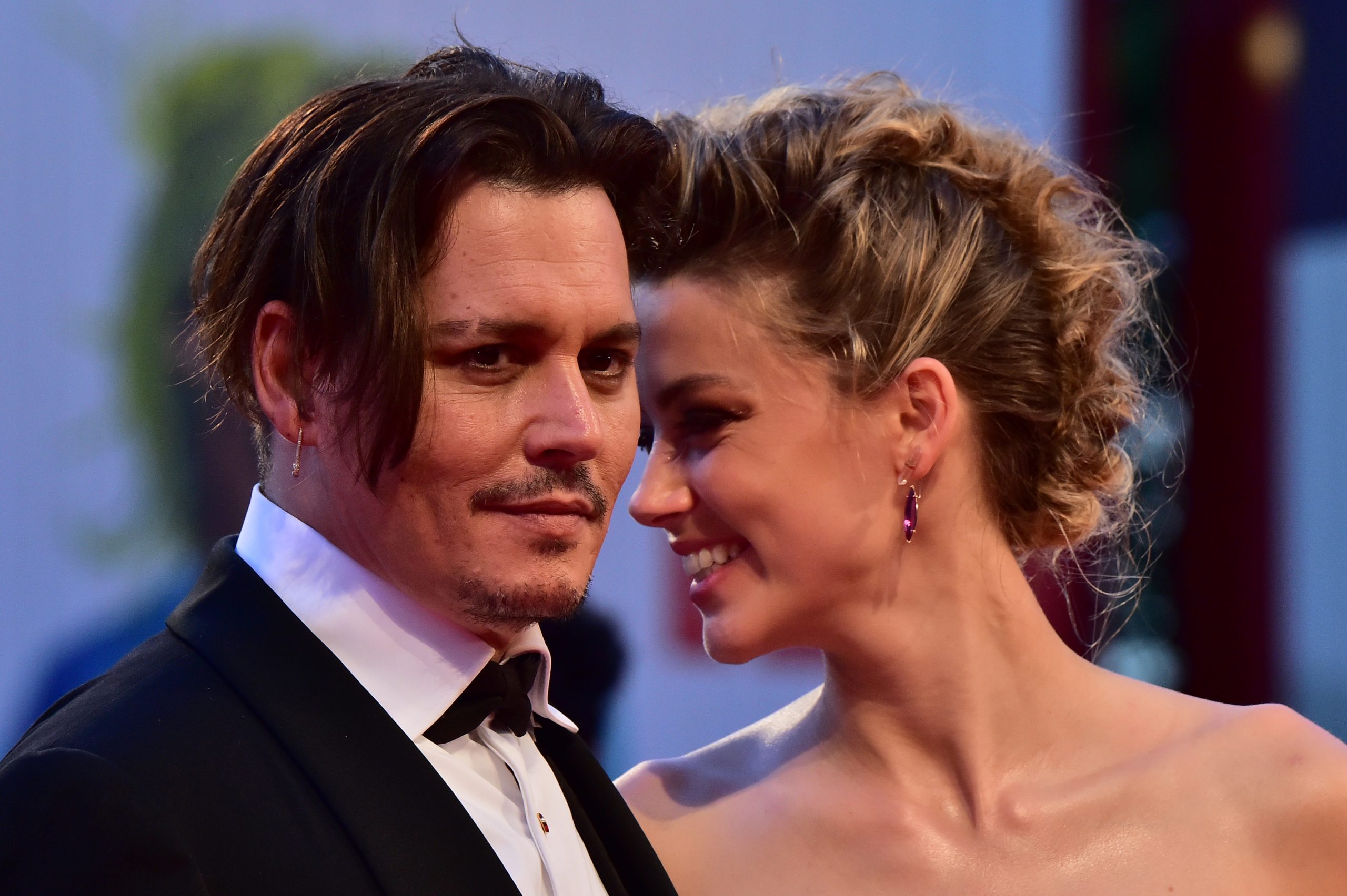 Amber Heard diz ter amado Johnny Depp
